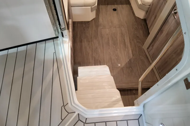  Yacht Photos Pics Interior view of 2026 Formula 380 Super Sport Crossover OB, featuring sleek wooden flooring.