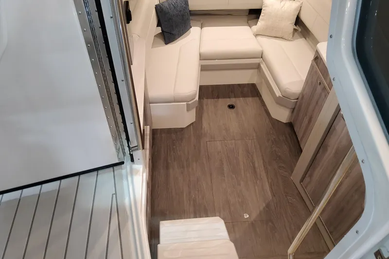  Yacht Photos Pics 2026 Formula 380 Super Sport Crossover OB cabin with modern seating and wood flooring.
