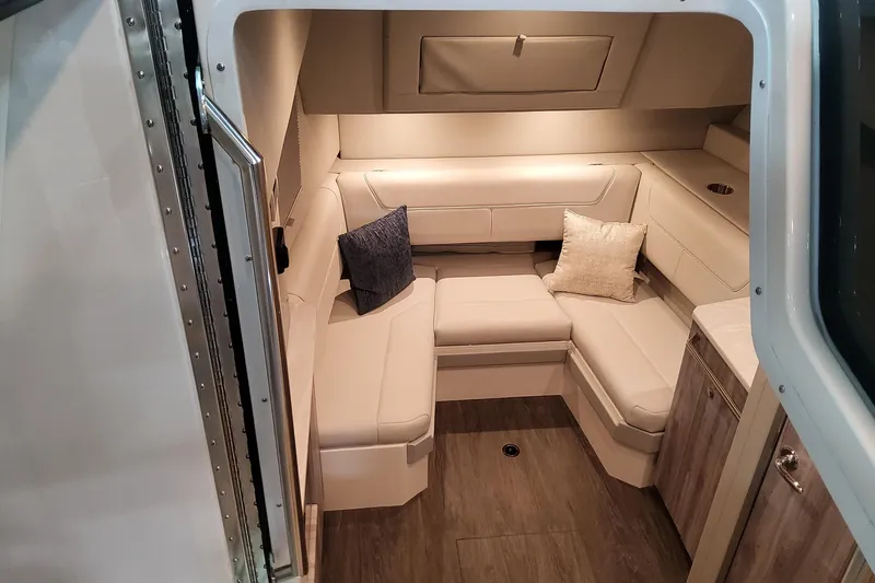  Yacht Photos Pics Luxurious interior of 2026 Formula 380 Super Sport Crossover OB with plush seating and cushions.