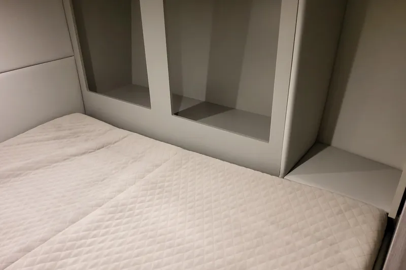  Yacht Photos Pics Interior cabin of 2026 Formula 380 Super Sport Crossover OB with quilted bedding.