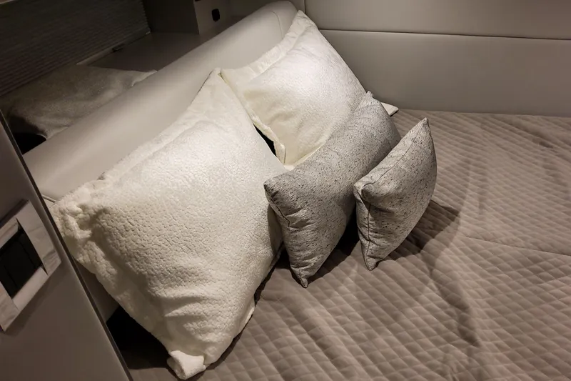  Yacht Photos Pics Luxurious bedding with plush pillows in the 2026 Formula 380 Super Sport Crossover OB.