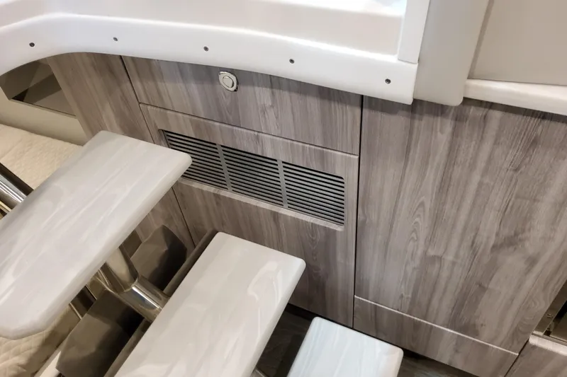  Yacht Photos Pics Interior of 2026 Formula 380 Super Sport Crossover OB, featuring sleek wooden cabinetry and steps.