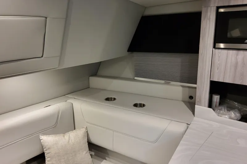  Yacht Photos Pics Interior of 2026 Formula 380 Super Sport Crossover OB, featuring modern seating and cabinetry.