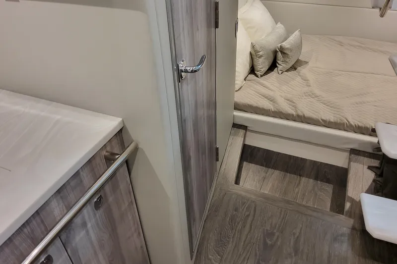  Yacht Photos Pics Interior of 2026 Formula 380 Super Sport Crossover OB, featuring a cozy cabin bed.