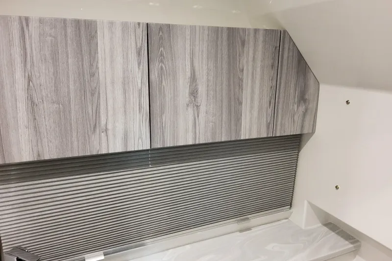  Yacht Photos Pics Interior of 2026 Formula 380 Super Sport Crossover OB with wood paneling and modern design.