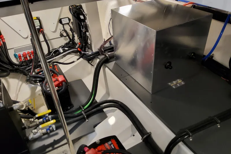  Yacht Photos Pics Engine compartment of 2026 Formula 380 Super Sport Crossover OB with wiring and components.