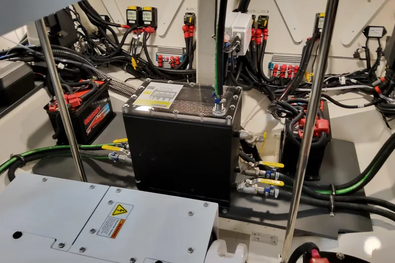  Yacht Photos Pics Engine compartment of 2026 Formula 380 Super Sport Crossover OB with wiring and battery systems.