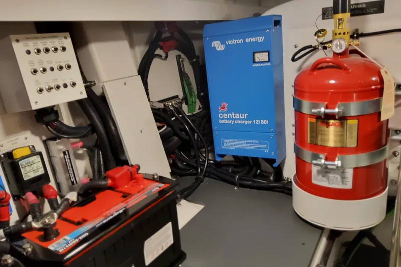  Yacht Photos Pics Engine room of 2026 Formula 380 Super Sport Crossover OB with battery charger and fire extinguisher.