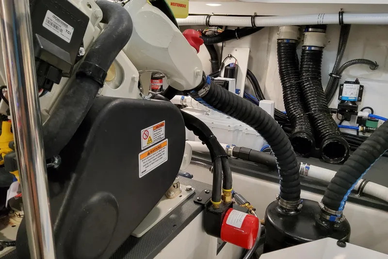  Yacht Photos Pics Engine compartment of 2026 Formula 380 Super Sport Crossover OB with hoses and components.