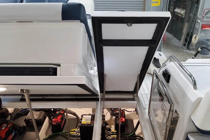  Yacht Photos Pics 2026 Formula 380 Super Sport Crossover OB engine compartment with open hatch, showcasing internal components.