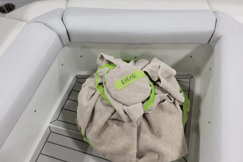  Yacht Photos Pics 2026 Formula 380 Super Sport Crossover OB storage compartment with covered radar equipment.