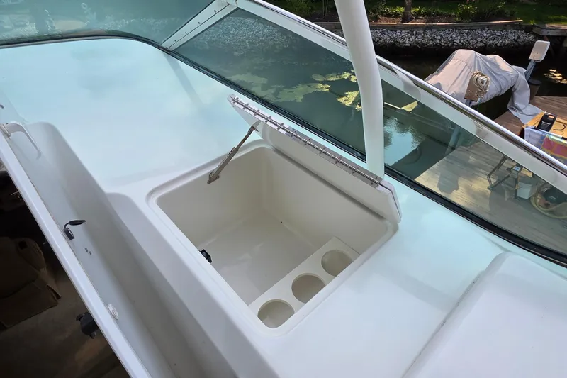 Mardi Gras Yacht Photos Pics 2006 Carver 56 Voyager boat with open storage compartment on deck.