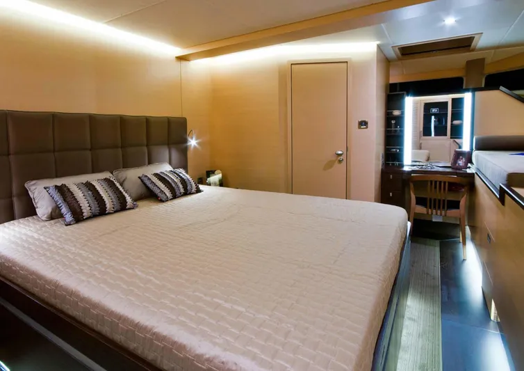 Ipharra Yacht Photos Pics Luxurious bedroom interior on 2009 Sunreef 31m yacht with modern furnishings.