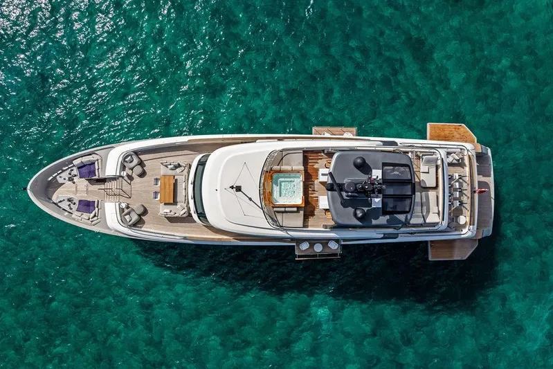 The Wolf Yacht Photos Pics Aerial view of 2023 Sanlorenzo SD118 yacht on turquoise water.