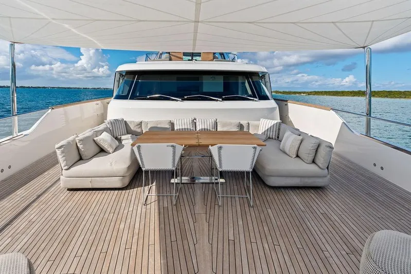 The Wolf Yacht Photos Pics Luxurious 2023 Sanlorenzo SD118 yacht deck with elegant seating and ocean view.