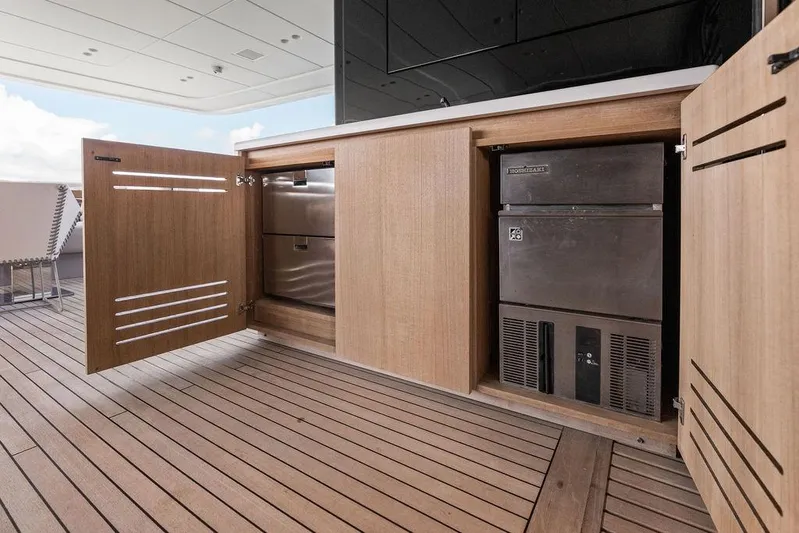 The Wolf Yacht Photos Pics Luxury yacht Sanlorenzo SD118 2023, featuring sleek wooden cabinetry and modern appliances.
