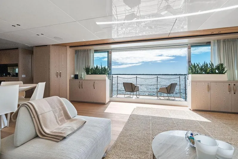 The Wolf Yacht Photos Pics Luxurious Sanlorenzo SD118 yacht interior with ocean view, modern decor, and elegant furnishings, 2023 model.