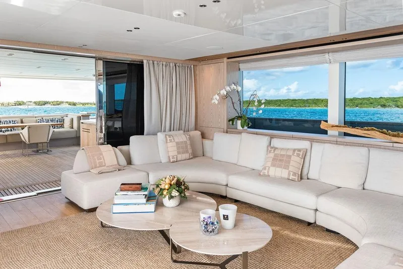 The Wolf Yacht Photos Pics Luxurious interior of 2023 Sanlorenzo SD118 yacht with elegant seating and ocean view.