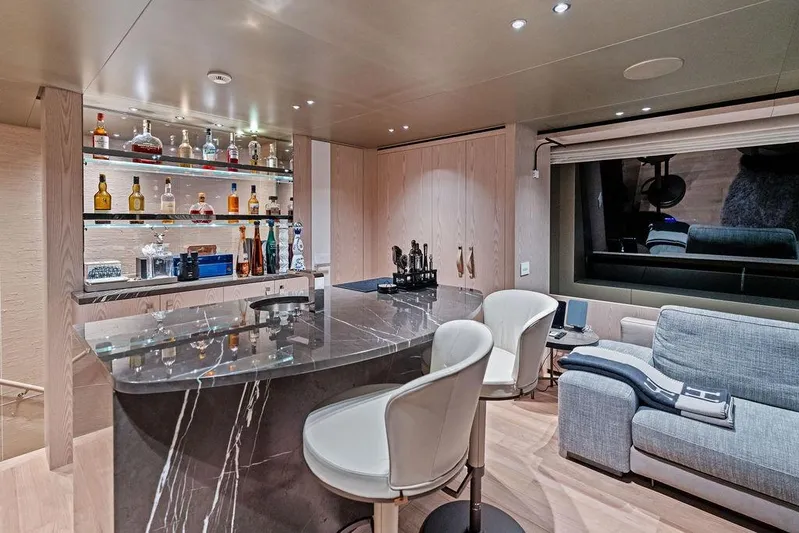 The Wolf Yacht Photos Pics Luxurious bar area on 2023 Sanlorenzo SD118 yacht with marble counter and elegant seating.