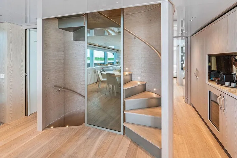 The Wolf Yacht Photos Pics Interior of Sanlorenzo SD118 yacht, modern staircase and kitchen, year 2023.
