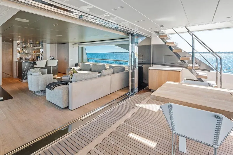 The Wolf Yacht Photos Pics Luxurious 2023 Sanlorenzo SD118 yacht interior with modern lounge, bar, and ocean view.
