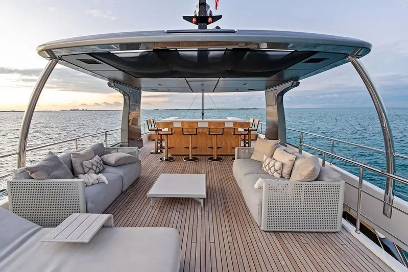 The Wolf Yacht Photos Pics Luxurious 2023 Sanlorenzo SD118 yacht deck with elegant seating and ocean view.