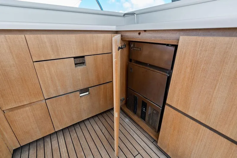 The Wolf Yacht Photos Pics Sanlorenzo SD118 yacht interior with wooden cabinetry and built-in appliances, 2023 model.