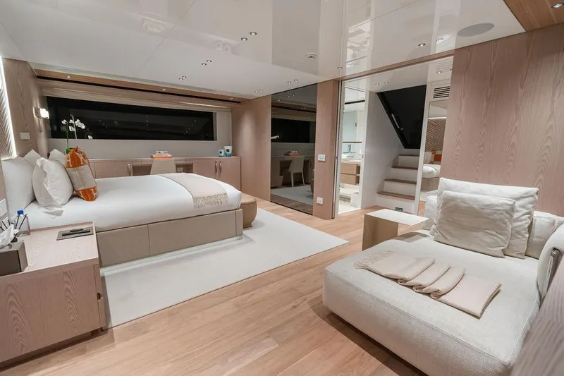 The Wolf Yacht Photos Pics Luxurious 2023 Sanlorenzo SD118 yacht bedroom with modern design and elegant furnishings.