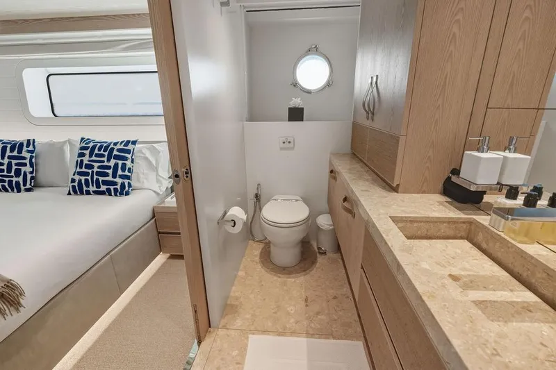 The Wolf Yacht Photos Pics Luxurious bathroom and bedroom on 2023 Sanlorenzo SD118 yacht, featuring modern design and amenities.