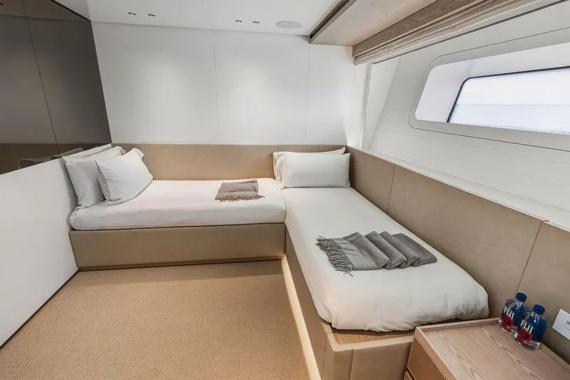The Wolf Yacht Photos Pics Luxurious twin cabin interior of 2023 Sanlorenzo SD118 yacht, featuring modern design and ocean view.