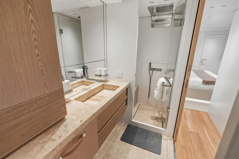 The Wolf Yacht Photos Pics Luxurious bathroom on 2023 Sanlorenzo SD118 yacht with modern fixtures and elegant design.