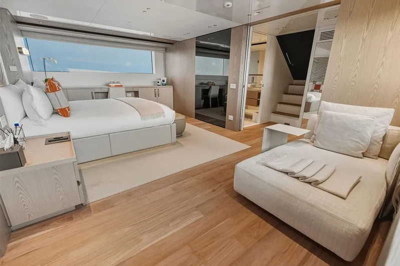The Wolf Yacht Photos Pics Luxurious 2023 Sanlorenzo SD118 yacht interior with modern bedroom and elegant furnishings.