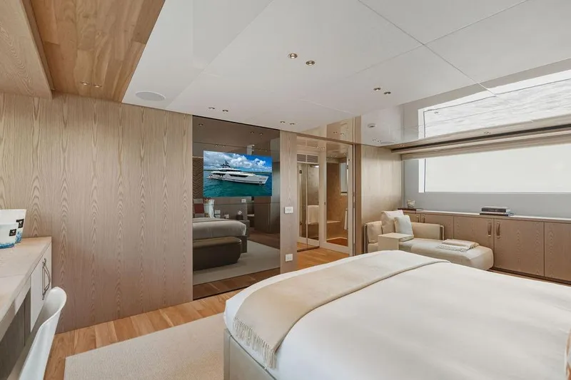 The Wolf Yacht Photos Pics Luxurious bedroom interior of 2023 Sanlorenzo SD118 yacht with modern design and elegant furnishings.