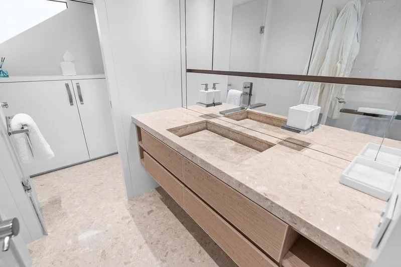 The Wolf Yacht Photos Pics Luxurious bathroom on 2023 Sanlorenzo SD118 yacht with elegant marble countertop.