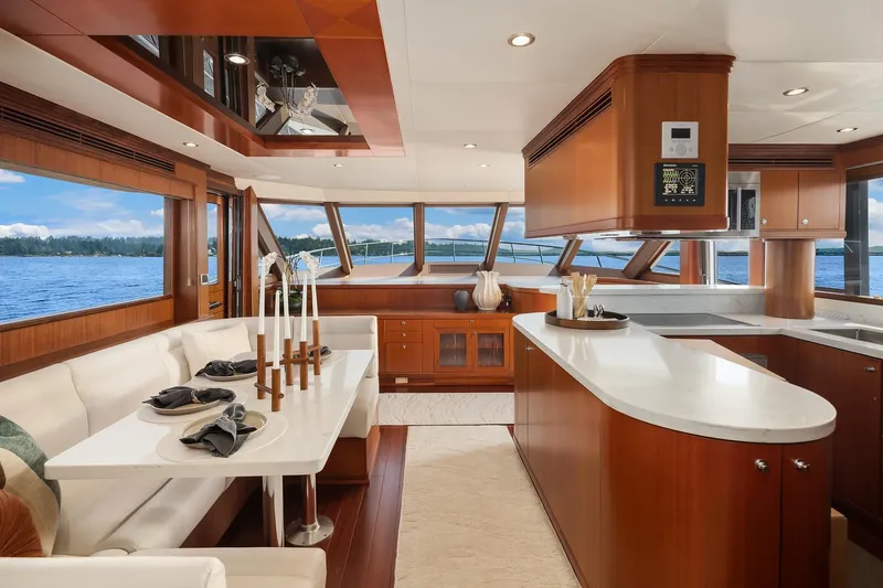 Estancia Yacht Photos Pics Luxurious interior of 2010 Ocean Alexander 80 Motoryacht with elegant dining and kitchen area.