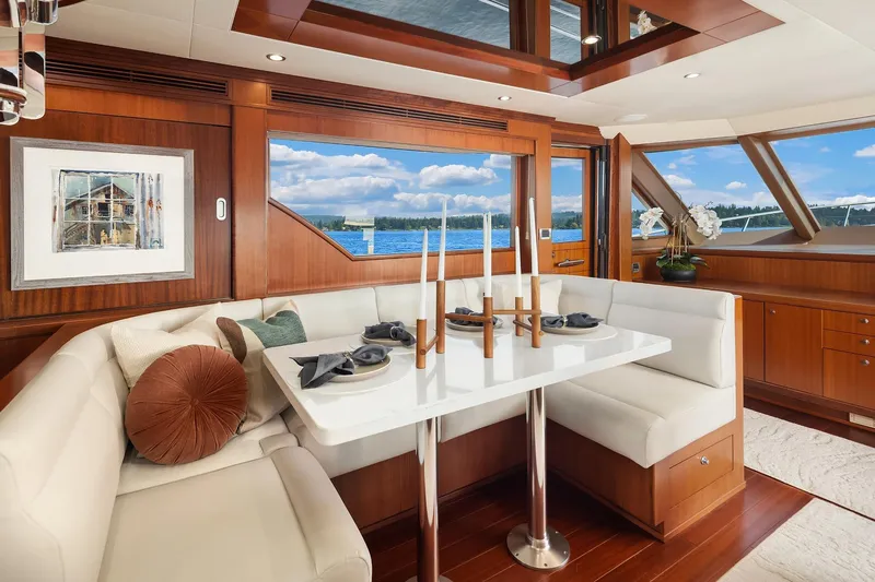 Estancia Yacht Photos Pics Luxurious interior of 2010 Ocean Alexander 80 Motoryacht with elegant dining area and scenic view.