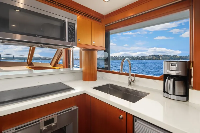 Estancia Yacht Photos Pics Luxurious kitchen in 2010 Ocean Alexander 80 Motoryacht with scenic ocean view.