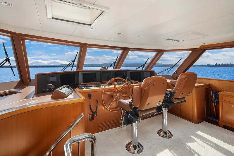 Estancia Yacht Photos Pics Pilothouse of 2010 Ocean Alexander 80 Motoryacht with panoramic windows and leather seating.