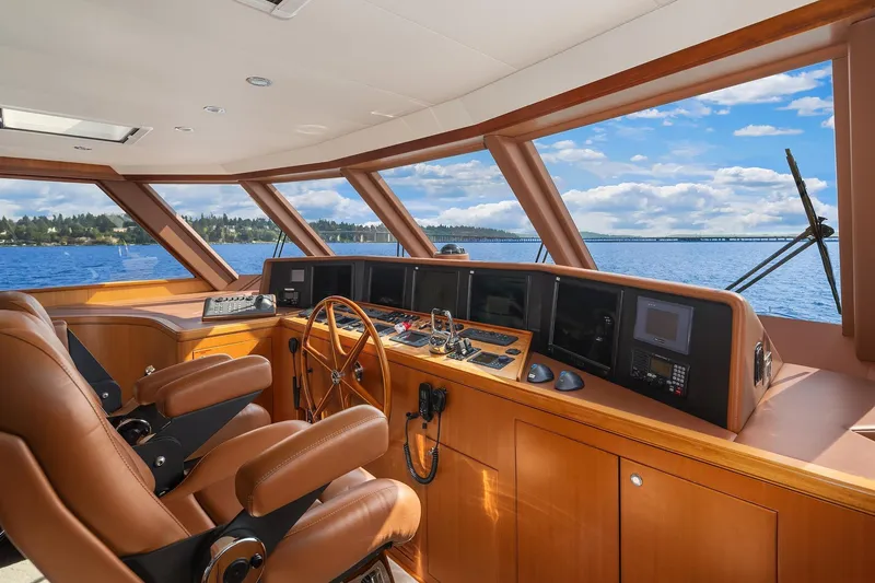 Estancia Yacht Photos Pics Pilothouse of 2010 Ocean Alexander 80 Motoryacht with leather seats and panoramic windows.
