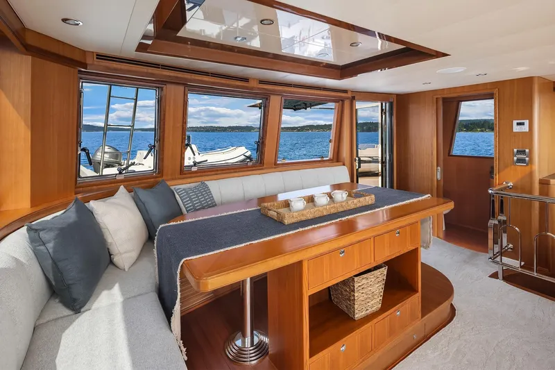 Estancia Yacht Photos Pics Luxurious interior of 2010 Ocean Alexander 80 Motoryacht with elegant wood finishes and scenic views.