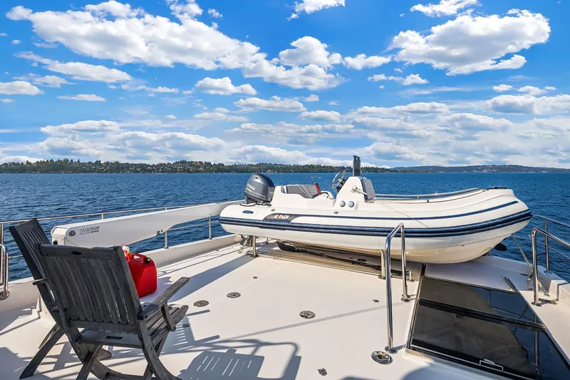 Estancia Yacht Photos Pics Ocean Alexander 80 Motoryacht 2010 with tender on deck, scenic lake view.