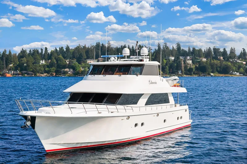 Estancia Yacht Photos Pics 2010 Ocean Alexander 80 Motoryacht on serene blue water with scenic background.