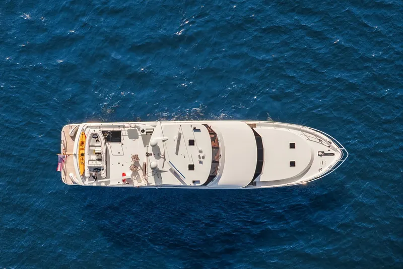 Estancia Yacht Photos Pics Aerial view of 2010 Ocean Alexander 80 Motoryacht cruising on blue ocean waters.