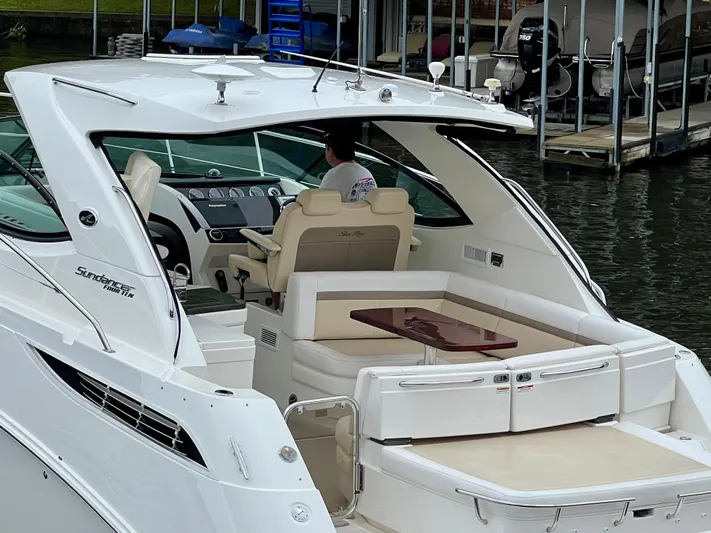  Yacht Photos Pics 2014 Sea Ray 410 Sundancer yacht with elegant seating and modern dashboard.