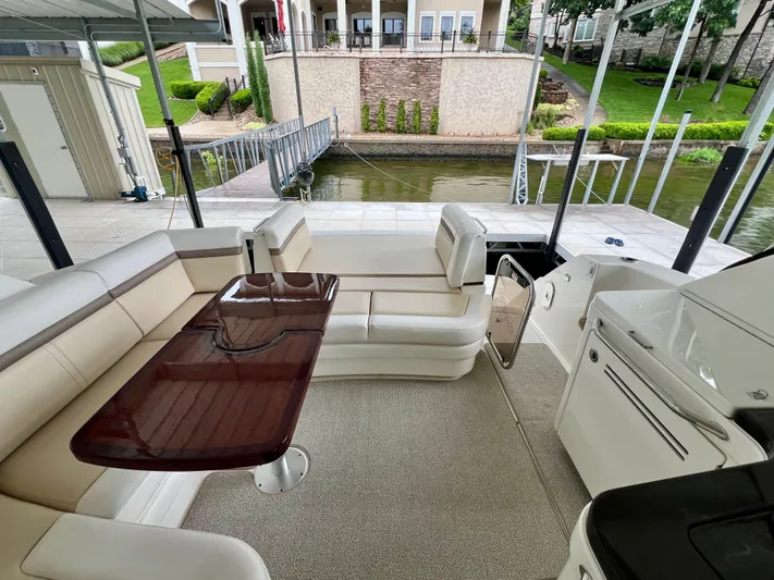  Yacht Photos Pics Luxurious 2014 Sea Ray 410 Sundancer yacht interior with elegant seating and polished table.