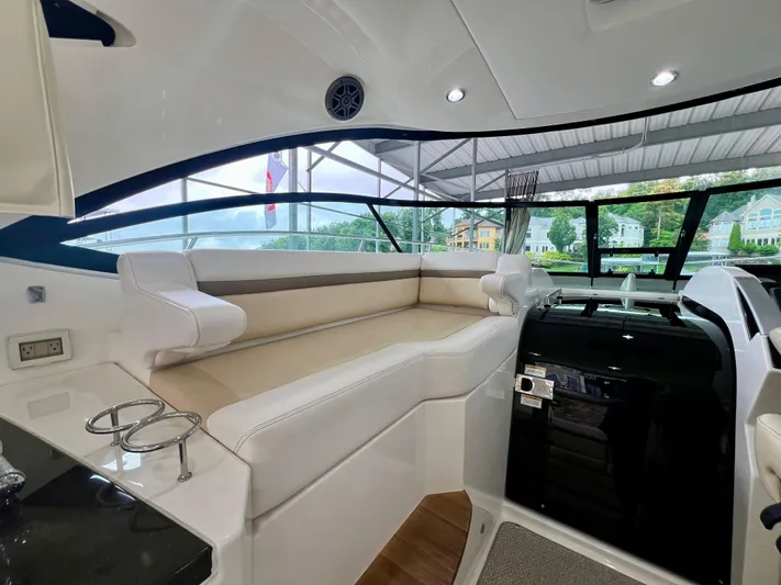  Yacht Photos Pics 2014 Sea Ray 410 Sundancer interior with plush seating and modern design.