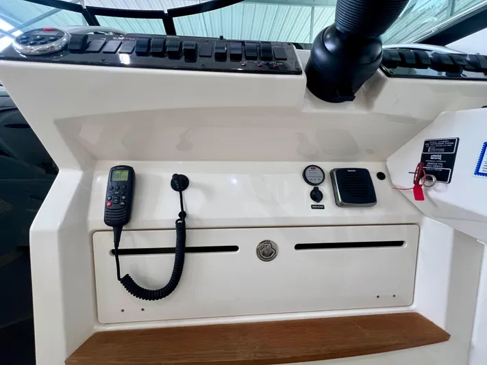  Yacht Photos Pics Control panel of a 2014 Sea Ray 410 Sundancer boat with communication equipment.