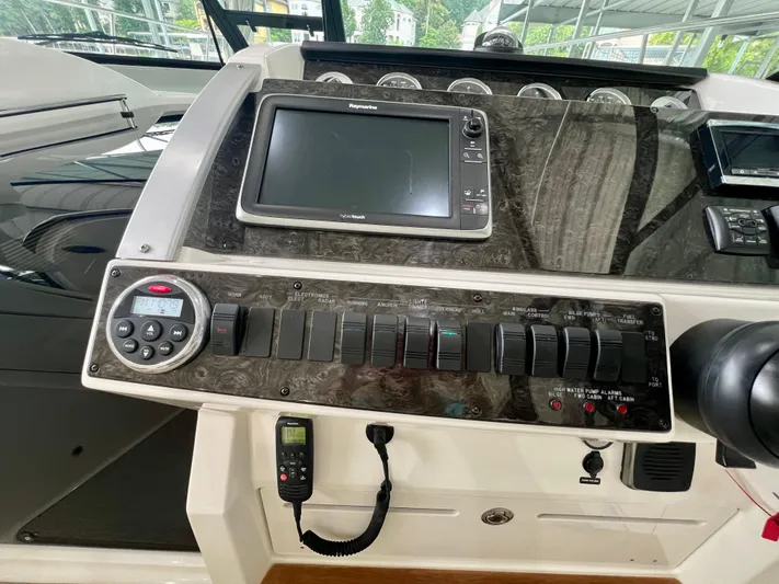  Yacht Photos Pics Control panel of a 2014 Sea Ray 410 Sundancer boat with navigation equipment.