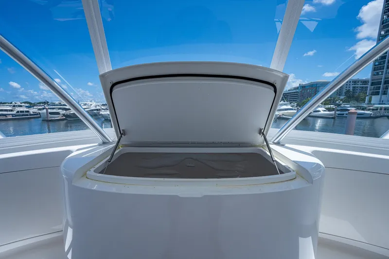 Gypsea Yacht Photos Pics Open storage compartment on 2015 Viking 66 Open yacht, docked at marina.