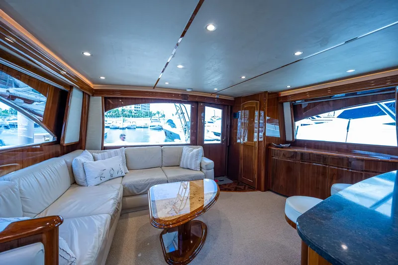 Gypsea Yacht Photos Pics Luxurious interior of 2015 Viking 66 Open yacht with plush seating and elegant wood finishes.